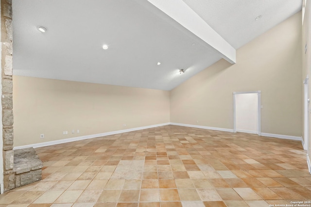 bonus room featuring vaulted ceiling with beams and baseboards