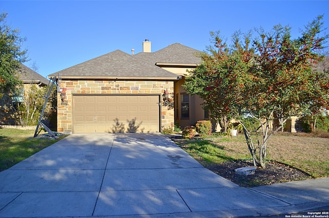 view of front facade with driveway, a garage, a shingled roof, stone siding, and a chimney