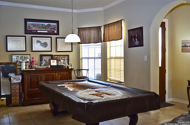 rec room featuring arched walkways, pool table, crown molding, and light tile patterned floors