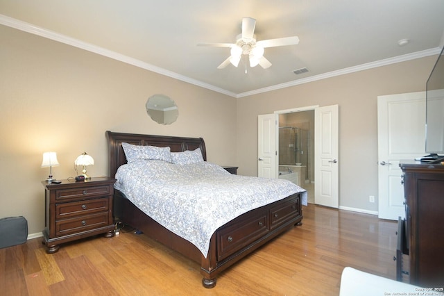 bedroom featuring visible vents, crown molding, light wood-style flooring, and baseboards