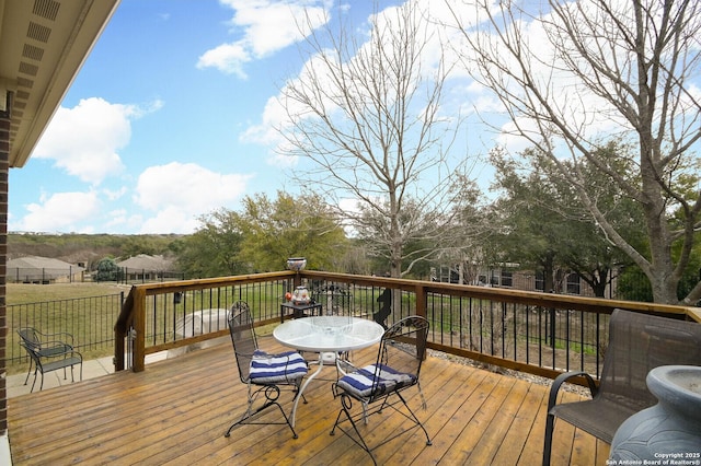 deck featuring outdoor dining space