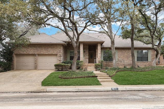 view of front facade featuring a garage, roof with shingles, concrete driveway, and brick siding