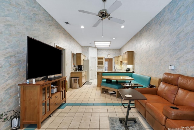 living room with recessed lighting, light tile patterned flooring, visible vents, and wallpapered walls