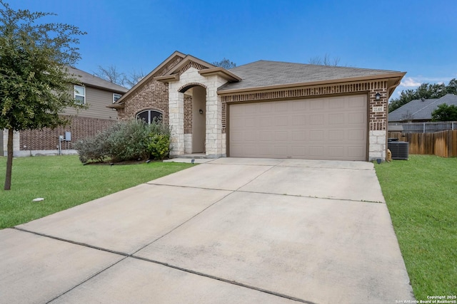 view of front of house with concrete driveway, a front lawn, stone siding, and brick siding