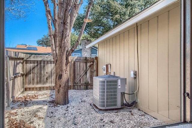 details with central air condition unit and fence