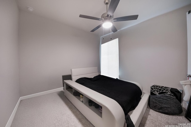 bedroom with baseboards, a ceiling fan, and light colored carpet