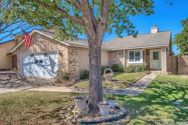 single story home featuring an attached garage, a chimney, fence, and brick siding