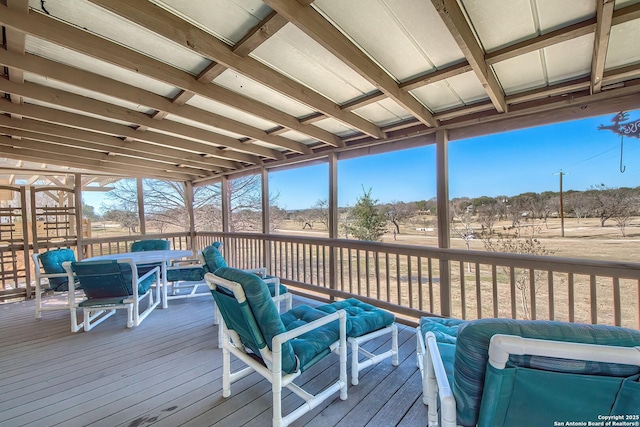 deck featuring outdoor dining area and outdoor lounge area