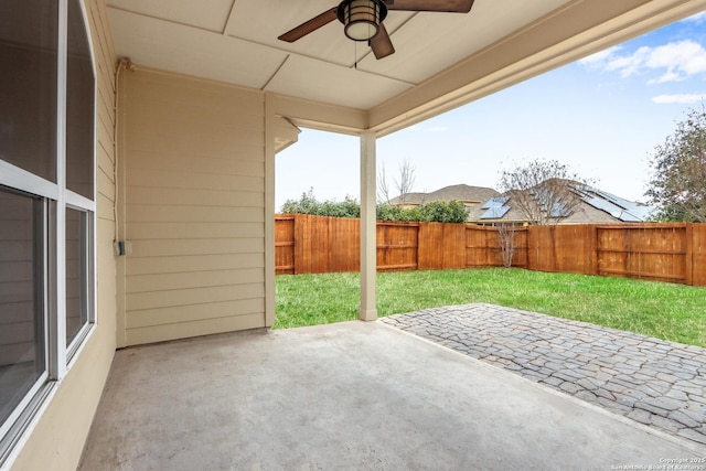 view of patio / terrace with ceiling fan and a fenced backyard