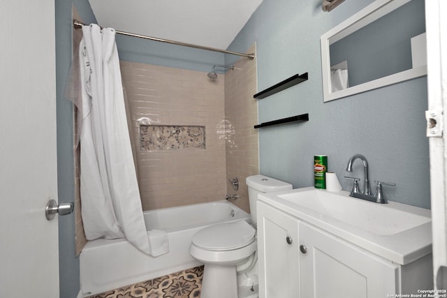 full bathroom featuring a textured wall, shower / tub combo with curtain, vanity, and toilet