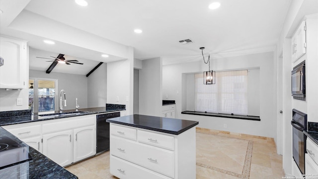 kitchen featuring recessed lighting, a sink, white cabinets, black appliances, and dark countertops