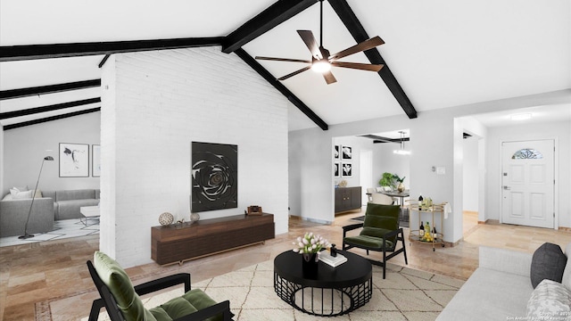 living area featuring ceiling fan, a fireplace, beam ceiling, and baseboards