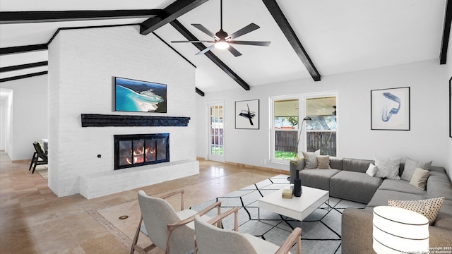 living area with high vaulted ceiling, a ceiling fan, baseboards, a brick fireplace, and beamed ceiling