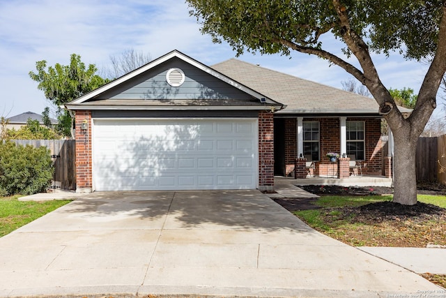 ranch-style home with fence, concrete driveway, and brick siding