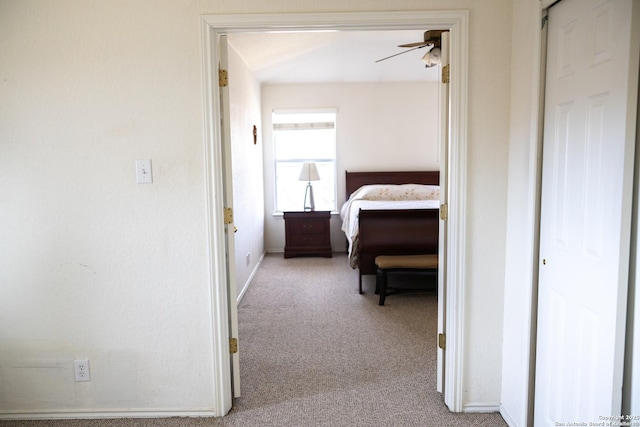 carpeted bedroom with baseboards