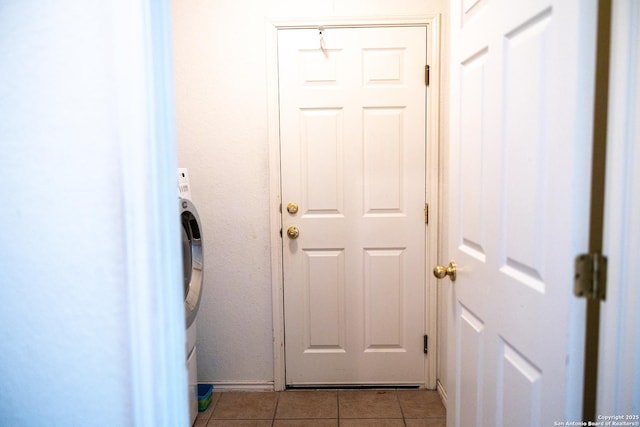 doorway featuring light tile patterned floors