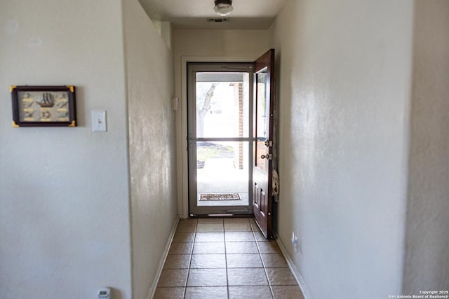 entryway featuring visible vents and baseboards