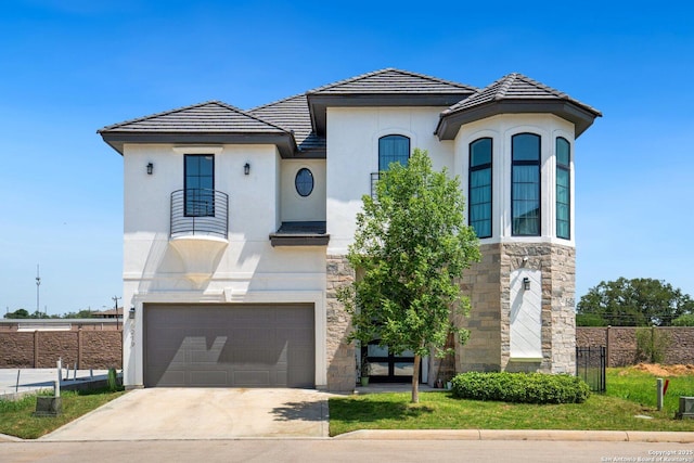5219 Breeze Way, San Antonio, TX 78249 - view of front facade with stone siding, a garage, fence, and a tiled roof