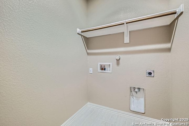 clothes washing area with hookup for a washing machine, hookup for a gas dryer, laundry area, and hookup for an electric dryer