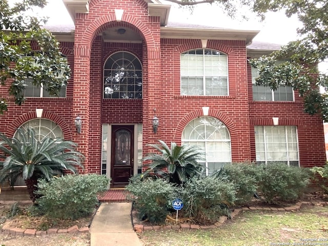 view of front of property with brick siding