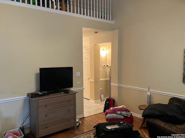 interior space with light wood-style flooring and baseboards