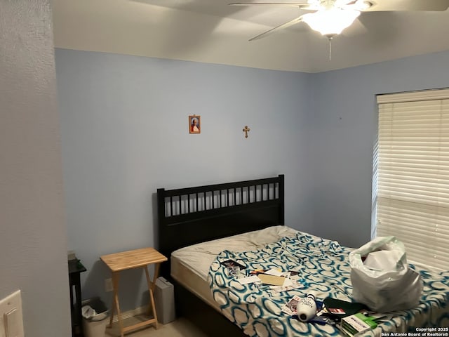 bedroom featuring a ceiling fan