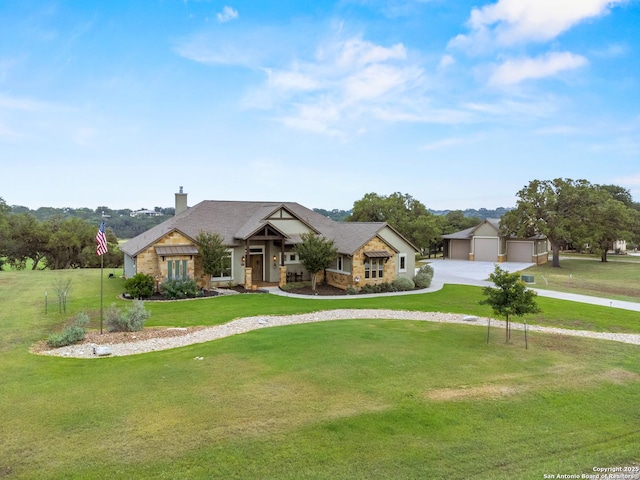 view of front of property with a chimney and a front lawn