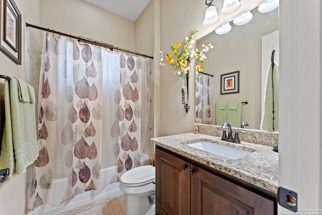 bathroom featuring toilet, shower / bath combination with curtain, vanity, and tile patterned floors