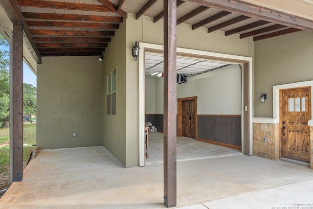 view of patio / terrace featuring an attached garage