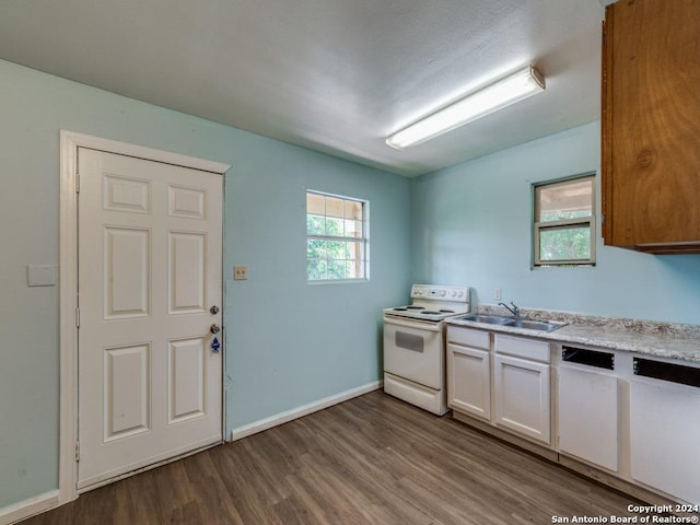 3315 Pitluk Ave, San Antonio, TX 78211 - kitchen featuring light countertops, white cabinetry, a sink, white appliances, and plenty of natural light