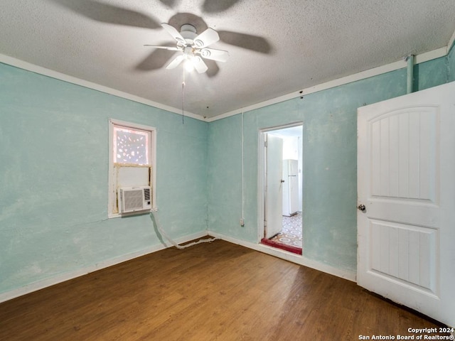 3315 Pitluk Ave, San Antonio, TX 78211 - empty room with a textured ceiling, cooling unit, wood finished floors, a ceiling fan, and ornamental molding