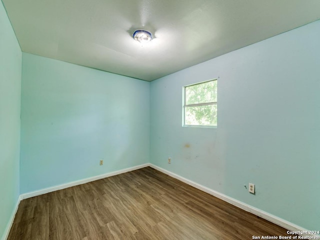 3315 Pitluk Ave, San Antonio, TX 78211 - unfurnished room with baseboards and wood finished floors