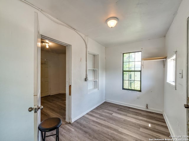 3315 Pitluk Ave, San Antonio, TX 78211 - spare room featuring baseboards and wood finished floors