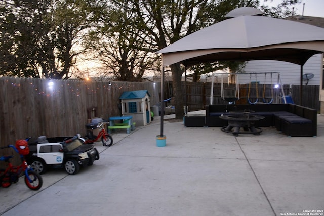 view of patio / terrace featuring a gazebo and a fenced backyard