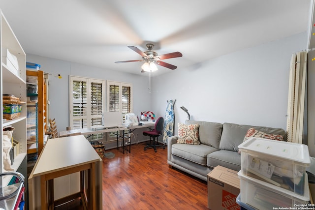 living room featuring a ceiling fan and dark wood-style flooring