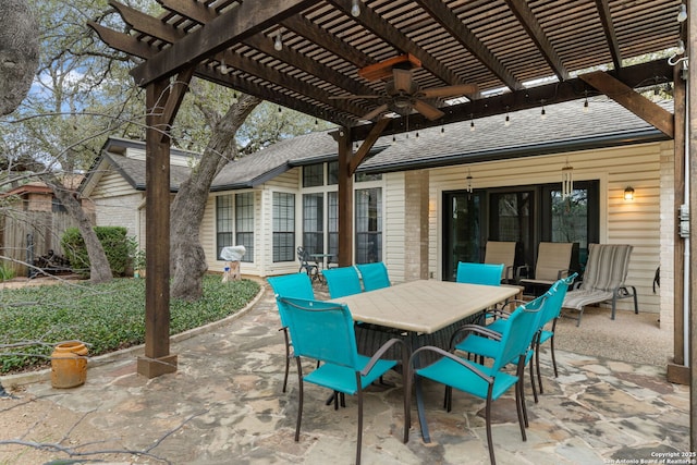 view of patio with outdoor dining space, a ceiling fan, and a pergola