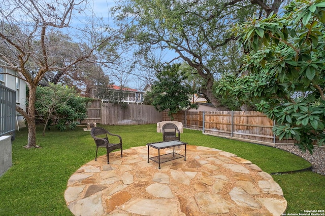 view of patio / terrace featuring a fenced backyard