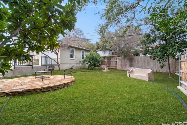 view of yard with a patio area and fence