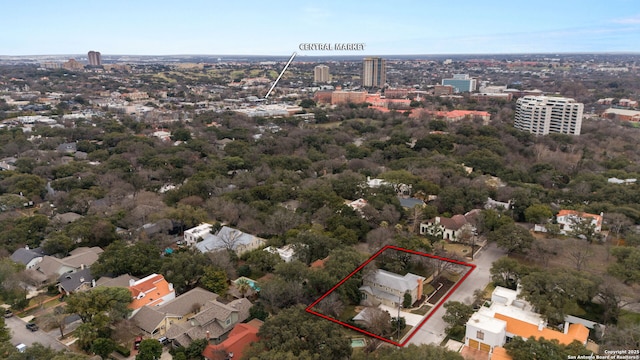 birds eye view of property with a city view