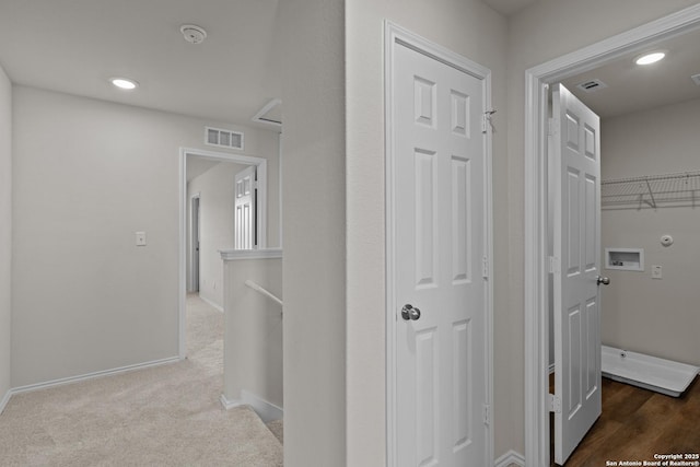 hallway featuring recessed lighting, an upstairs landing, visible vents, baseboards, and carpet