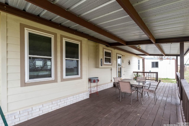 deck with outdoor dining space