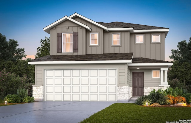 view of front facade with stone siding, concrete driveway, board and batten siding, and an attached garage