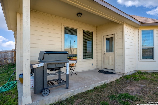 view of patio with fence