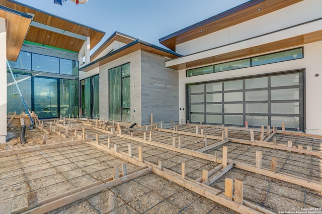 exterior space featuring stucco siding