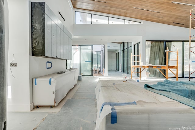 interior space with wooden ceiling and vaulted ceiling