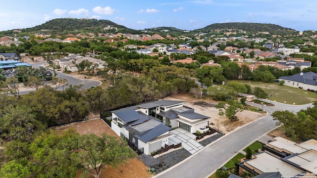 bird's eye view with a residential view and a mountain view