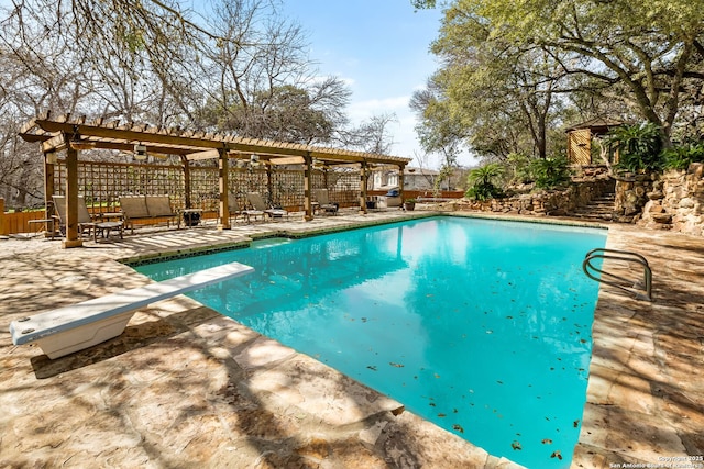 view of pool with a diving board, a patio area, a fenced in pool, and a pergola