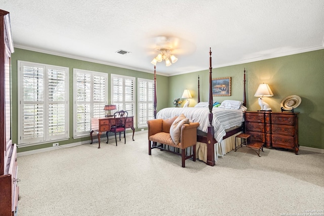 bedroom featuring visible vents, a textured ceiling, and ornamental molding