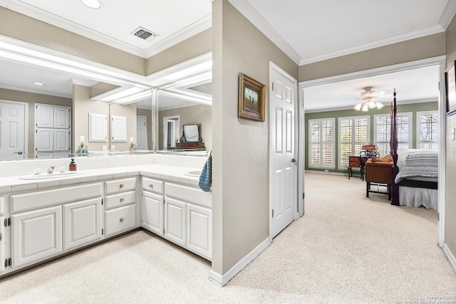 full bath featuring crown molding, double vanity, visible vents, ensuite bathroom, and a sink