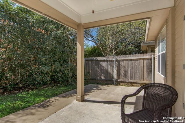 view of patio featuring fence